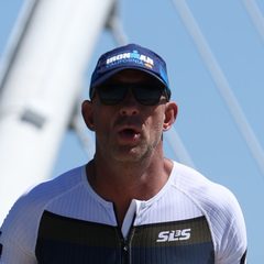 Dean running the IRONMAN course